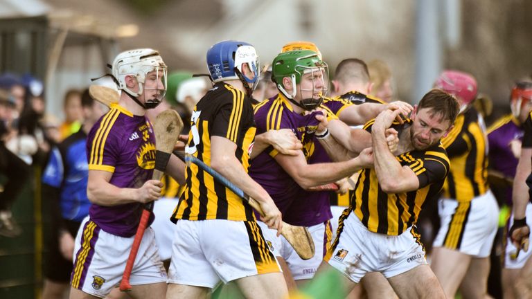 No love lost: Wexford and Kilkenny players tussle during the Walsh Cup semi-final