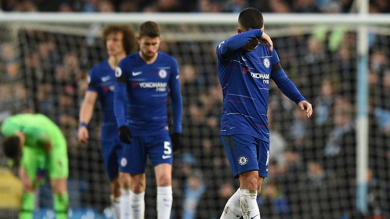 Chelsea look dejected during a torrid show at the Etihad