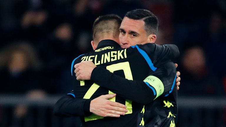 Piotr Zielinski celebrates with Jose Callejon after scoring Napoli's third goal 