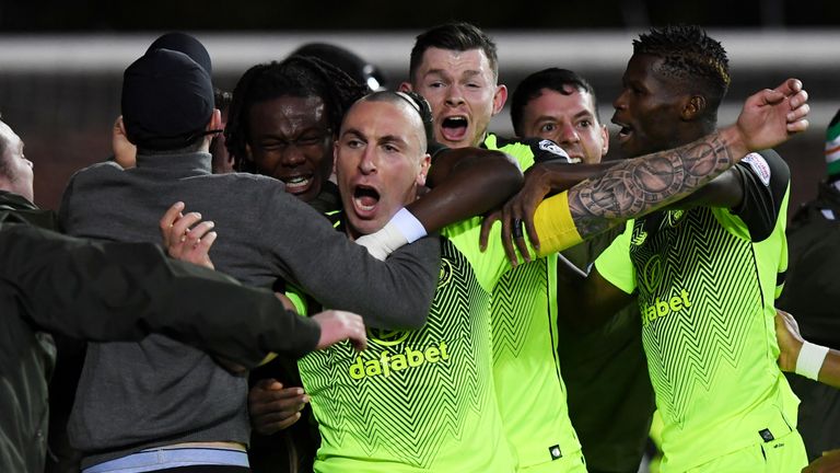 Brown celebrates his late winner at Rugby Park