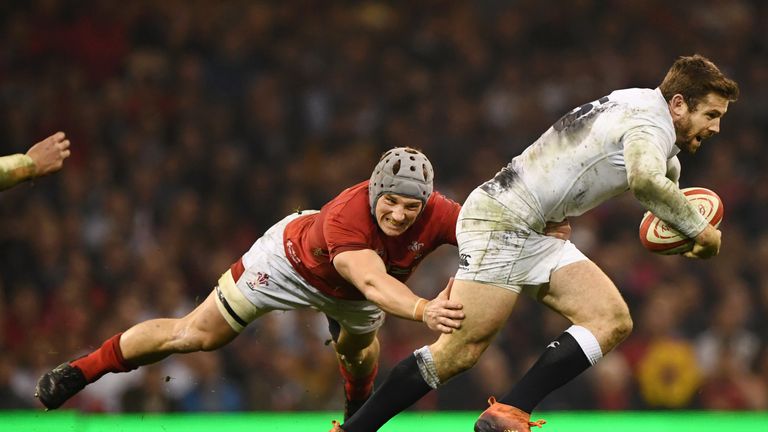 Wales' Jonathan Davies shackles England's Elliot Daly