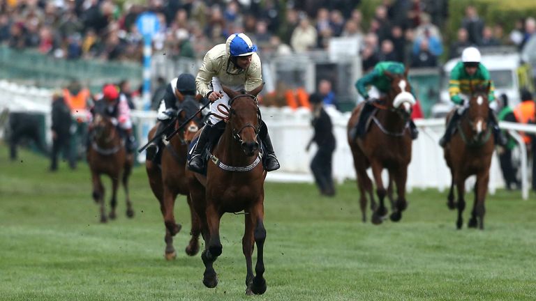Jockey Alex Edwards celebrates his victory in the St. James's Place Foxhunter Challenge Cup Open Hunters' Chase on Hazel Hill