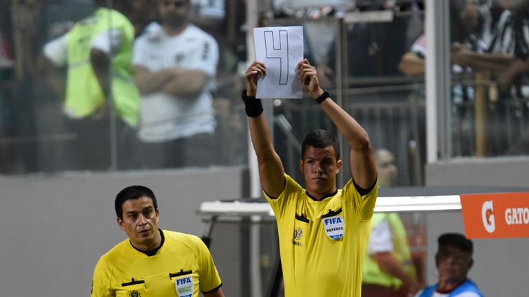 Officials used hand-made signs in the absence of an electronic board