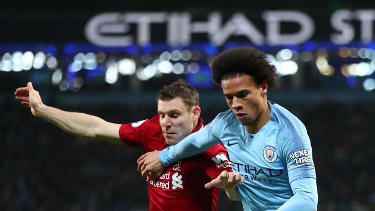 James Milner and Leroy Sane battle for possession during Manchester City vs Liverpool