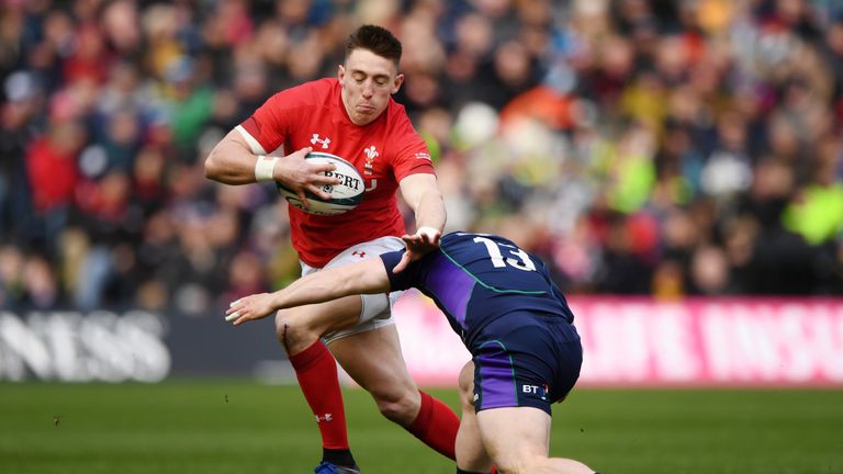 Josh Adams  is tackled by Nick Grigg 