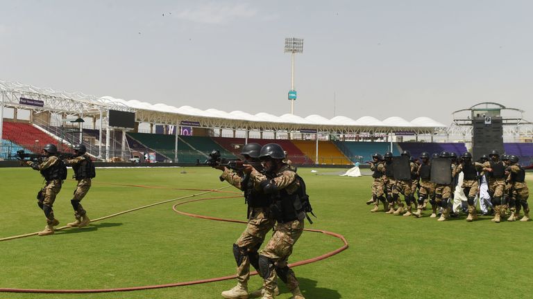Pakistani soldiers take part in a drill exercise at Karachi's National Cricket Stadium