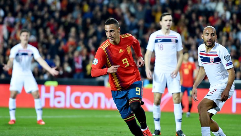 Striker Rodrigo wheels away after firing Spain ahead in the first half
