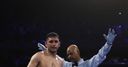 Khan loses by sixth-round TKO