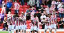 Stoke put Norwich promotion party on hold