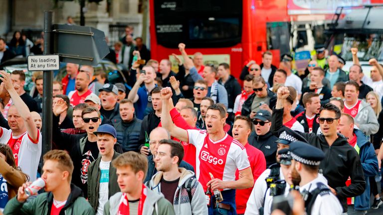 Partying Ajax fans bring Leicester Square to a standstill ahead of their Champions League semi-final, first leg, at Tottenham.