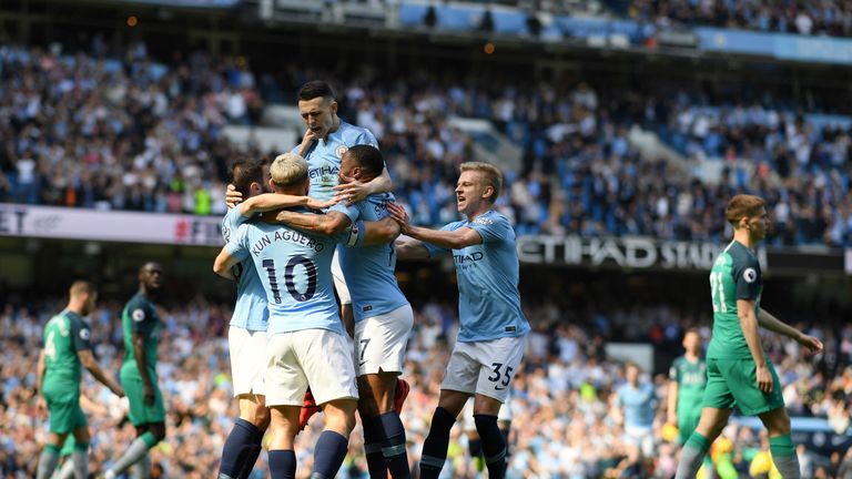Phil Foden (centre) celebrates his goal against Spurs