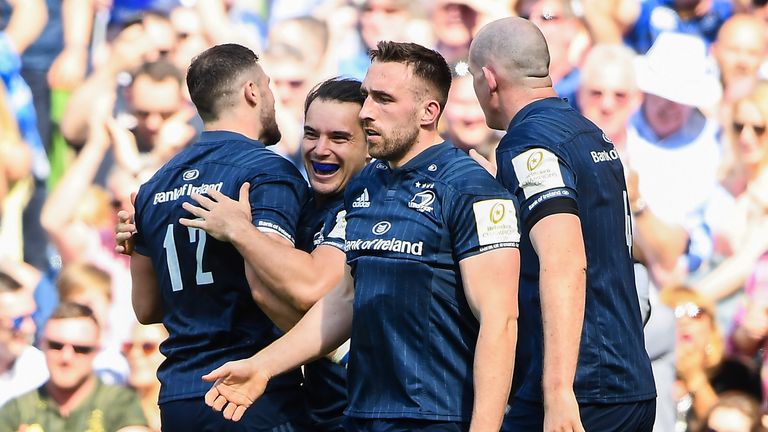 James Lowe celebrates with team-mates after scoring Leinster's first try