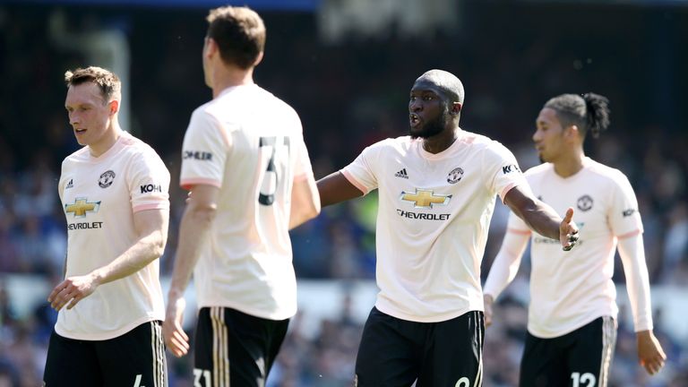 United's players look dejected at Goodison Park during their 4-0 defeat by Everton