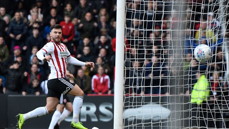 Scott Hogan scored the first goal in Sheffield United's 2-0 win over Ipswich - a result that effectively sealed their return to the Premier League