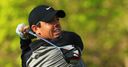 McIlroy rallies to make cut