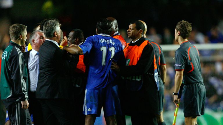 Stewards intervene as Drogba looked to confront Ovrebo over his performance