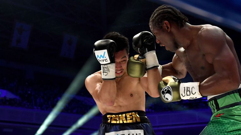 N'Dam (R) twice fought Murata in Japan