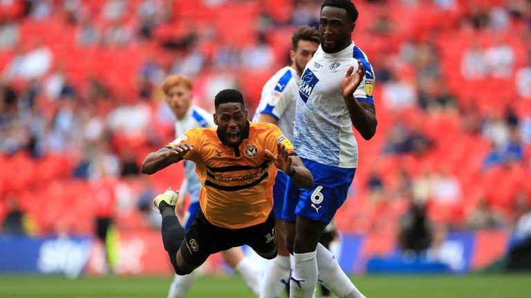 Jamille Matt was denied a penalty by referee Ross Joyce after this challenge from Manny Monthe