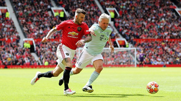 Beckham in action for the Man Utd legends match against Bayern
