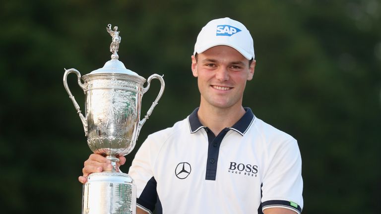 Martin Kaymer proudly displays the US Open trophy after his 2014 success at Pinehurst