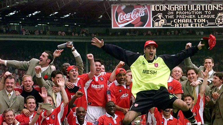 Charlton goalkeeper Sasa Ilic jumps in the air in celebration