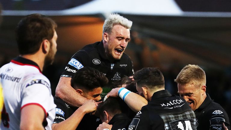 Glasgow players swamp Pete Horne to celebrate his try against Ulster