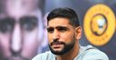 Khan's opponent injured in car crash