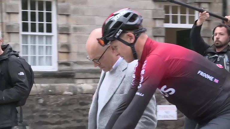 Sir David Brailsford earlier said Chris Froome fractured his leg after crashing into a wall while trying to blow his nose