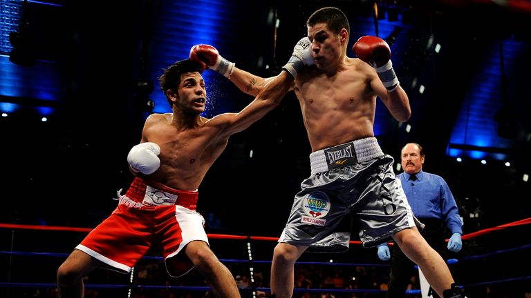 Billy Dib (L) has stepped in to face Amir Khan