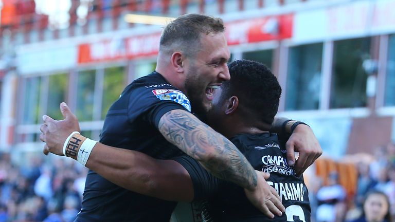 Bureta Faraimo and Josh Griffin celebrate Hull FC's opening try