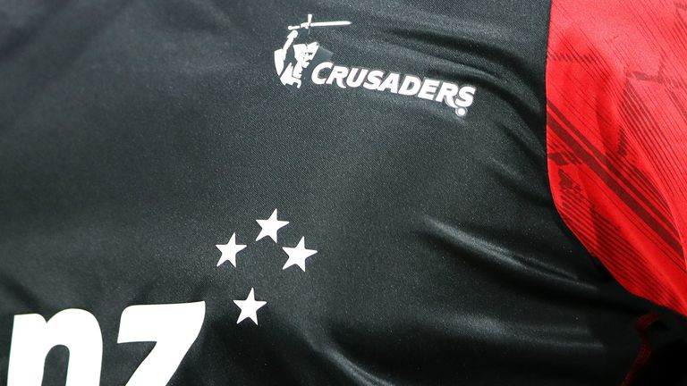 The Crusaders branding includes a logo of a sword-wielding knight