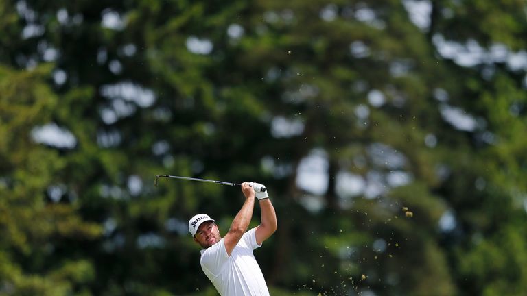 McDowell holed from 30 feet at the last to ensure a berth at his home course of Royal Portrush