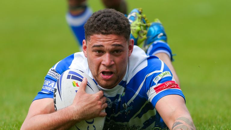  Halifax's James Woodburn-Hall scores a try