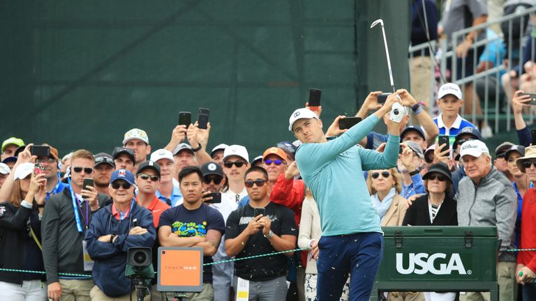 Spieth drove in the water at the eighth and then flew the green with his third