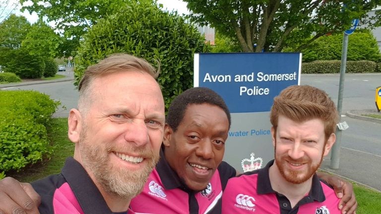 Kenneth Macharia, flanked by two of his Bristol Bisons team-mates, at a check-in last month (picture via @bisonsrfc on Twitter)