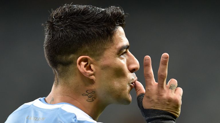 Luis Suarez celebrates his goal in Uruguay's win over Ecuador