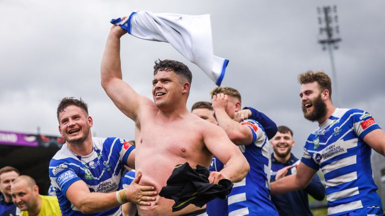 Halifax captain Scott Murrell celebrates the win