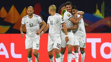 Riyad Mahrez is congratulated after his stunning goal in Algeria's win over Guinea
