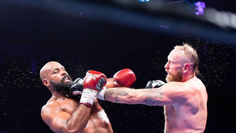 Washington (left) beat Helenius