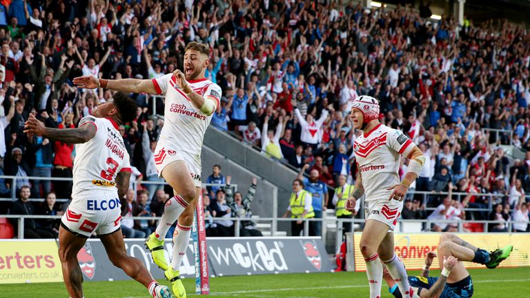 Kevin Maiqama celebrates his try - St Helens' fourth against the Warriors