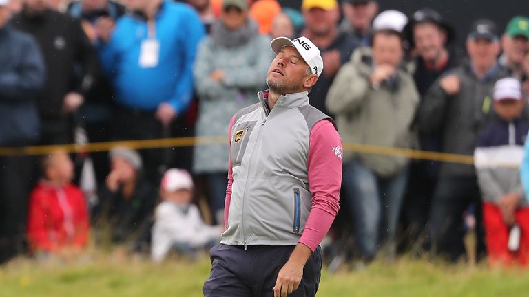 Westwood shows his frustration after missing a putt during the final round in which he mixed four birdies with six bogeys