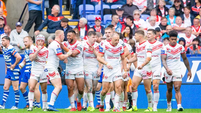 St Helens celebrate Dominique Peyroux's try against Halifax on Saturday