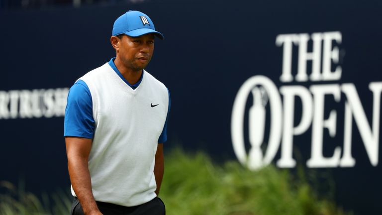  Woods appeared to be in pain after his first tee shot