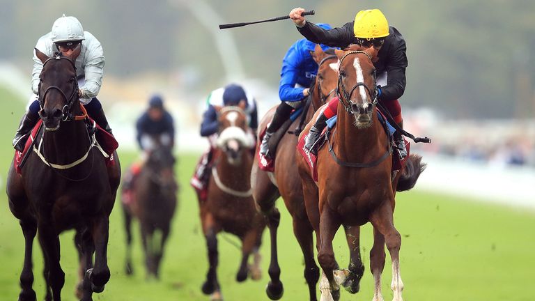 Frankie Dettori celebrates on Stradivarius