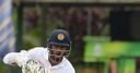 Karunaratne steadies SL on rain-hit day