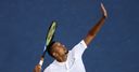 Kyrgios charges into second
