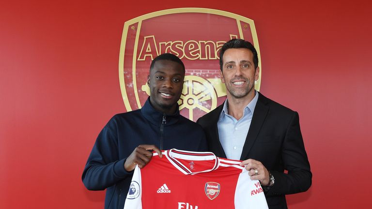 Nicolas Pepe with technical director Edu after signing for Arsenal in the summer of 2019