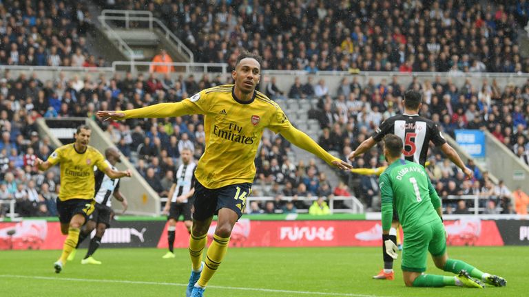 Pierre-Emerick Aubameyang celebrates opening the scoring for Arsenal