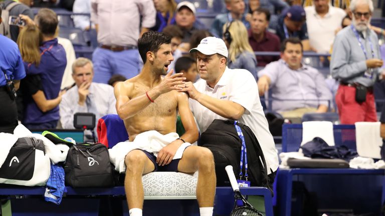 Novak Djokovic plays through shoulder injury to advance at ...