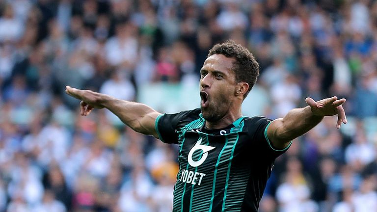 Swansea City's Wayne Routledge celebrates after he scores the winner